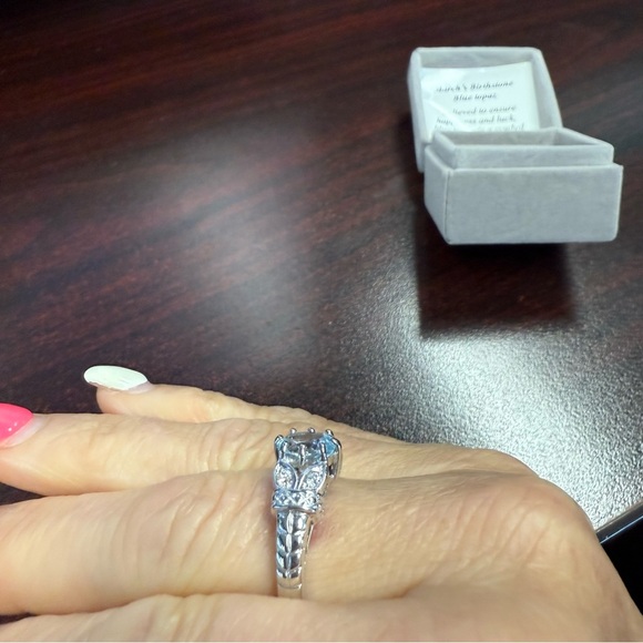 Avon March birthstone Blue Topaz  Ring in Silvertone - Picture 2 of 7